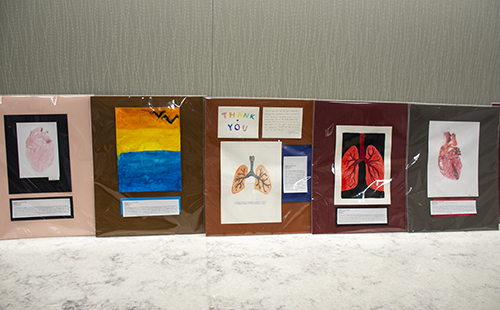 four different artworks created by middle school-aged children.
